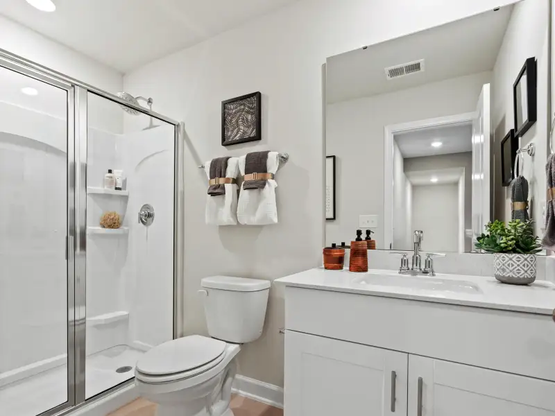 Furnished interior view inside a new home in Waterside - Coastline Series, Longs (Image 29). Furnished interior view inside a new home in Waterside - Coastline Series, Longs (Image 29).