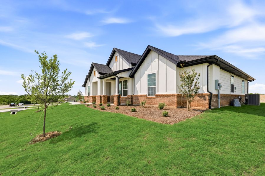 Front exterior of a new home in Saddleback Estates, Boyd, TX, highlighting curb appeal (Image 27).