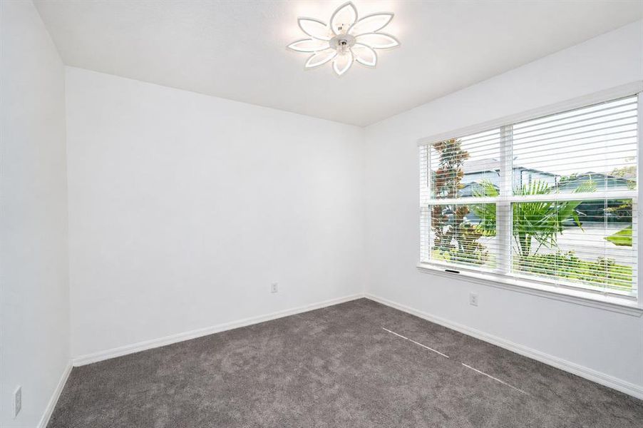 Spacious, unfurnished interior of a new home in North Park Isle, Plant City (Image 19).