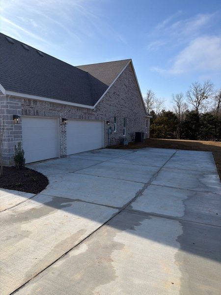 Front exterior of a new home in Grayson Ridge, Van Alstyne, TX, highlighting curb appeal (Image 4). Front exterior of a new home in Grayson Ridge, Van Alstyne, TX, highlighting curb appeal (Image 4).