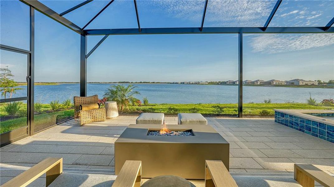 Primary suite lanai with built-in gas fire pit.