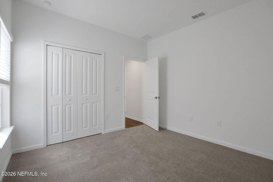 Spacious, unfurnished interior of a new home in Amberly, Green Cove Springs (Image 36).