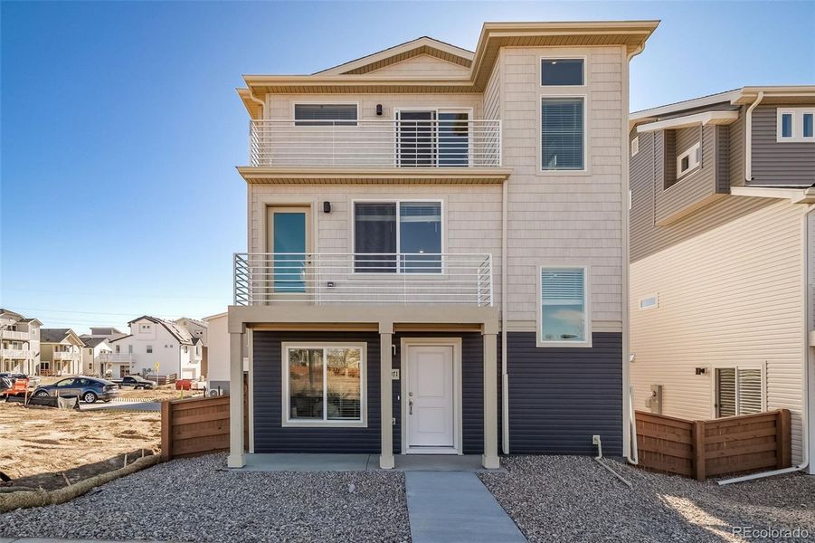 Front exterior of a new home in , Commerce City, CO, highlighting curb appeal (Image 1).