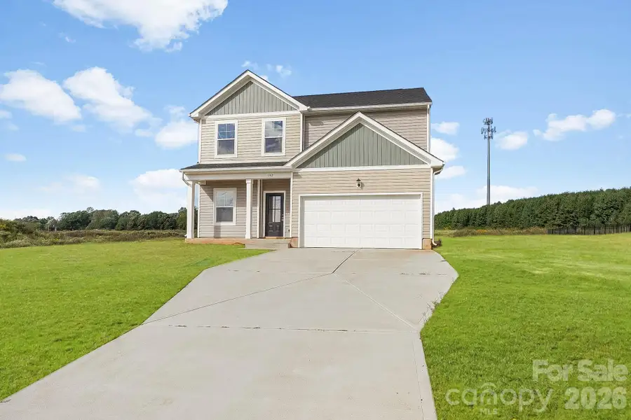 Front exterior of a new home in , Statesville, NC, highlighting curb appeal (Image 23). Front exterior of a new home in , Statesville, NC, highlighting curb appeal (Image 23).