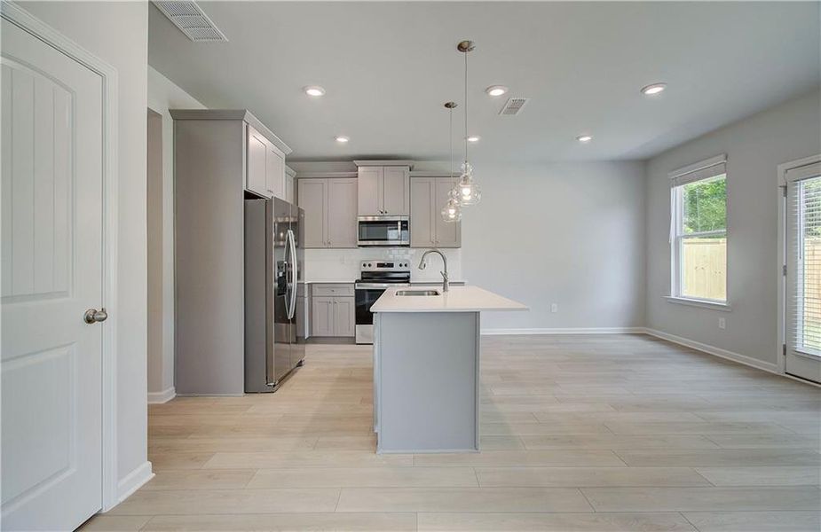 Furnished interior view inside a new home in Enclave at Evergreen, Fairburn (Image 5).