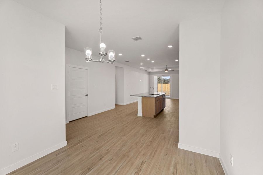 Representative unfurnished interior of a home built from the Clovis by Hakes Brothers in Hunters Ranch, San Antonio (Image 12).