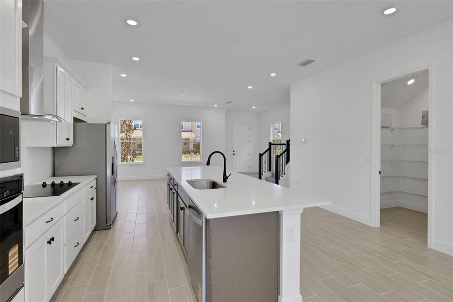 Furnished interior view inside a new home in Serenade at Ovation, Winter Garden (Image 15). Furnished interior view inside a new home in Serenade at Ovation, Winter Garden (Image 15).