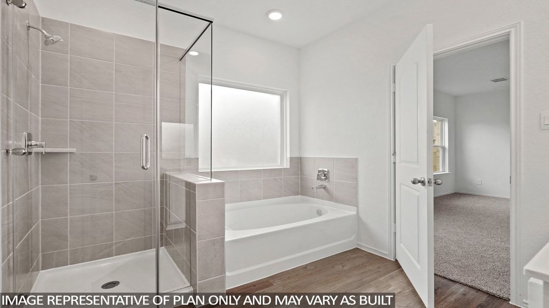 Furnished interior view inside a new home in Sunterra, Katy (Image 8).