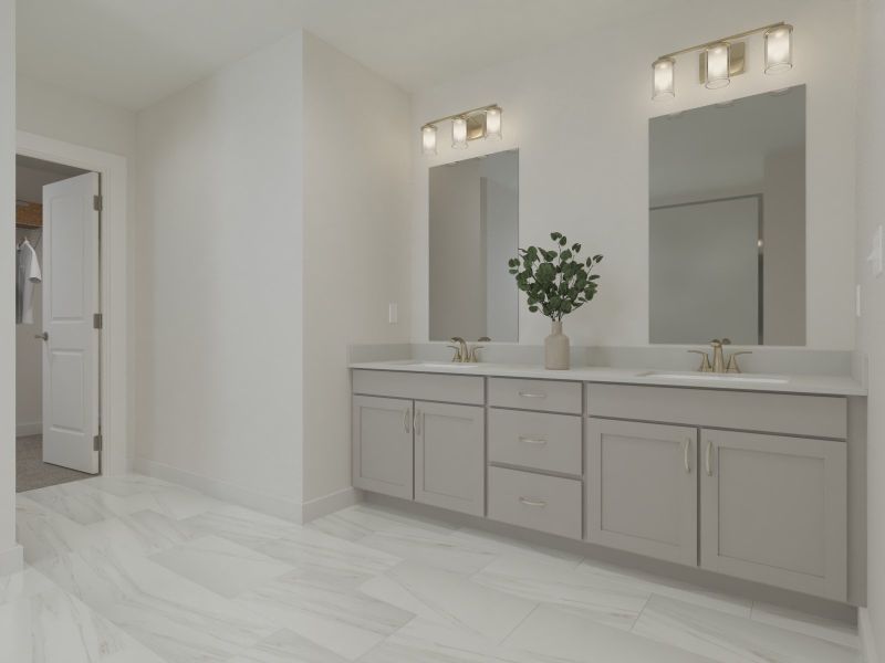 The primary bathroom offers dual vanity sinks and a walk-in shower. The primary bathroom offers dual vanity sinks and a walk-in shower.