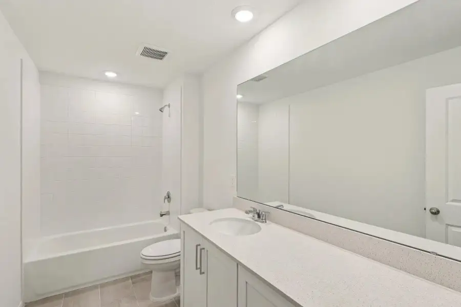 Furnished interior view inside a new home in Northlake at Ovation, Winter Garden (Image 11).