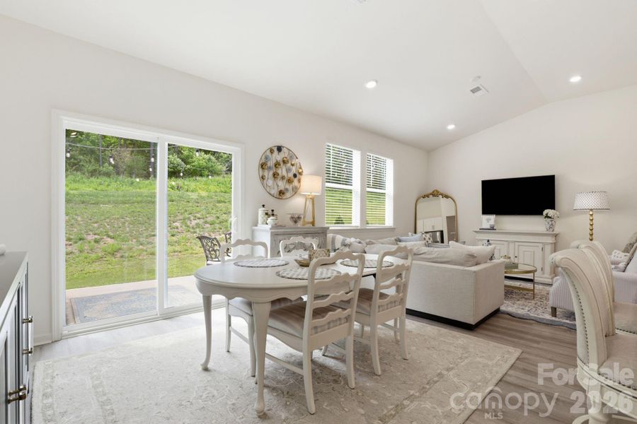 Dining opens to backyard