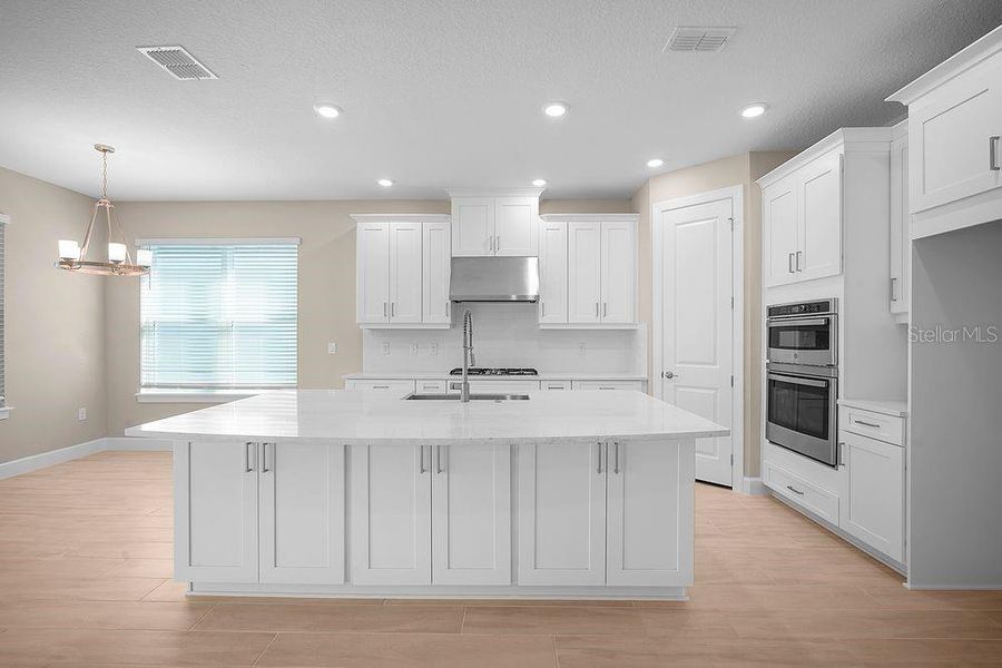 Furnished interior view inside a new home in Esplanade at Wiregrass Ranch, Wesley Chapel (Image 12).