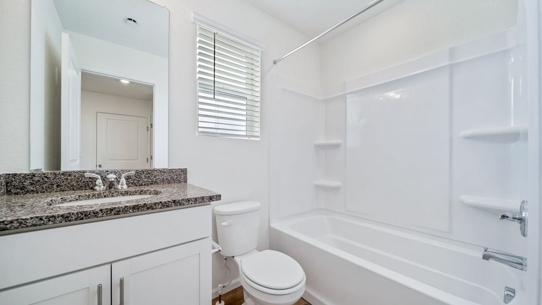 Furnished interior view inside a new home in Reunion, Commerce City (Image 9).