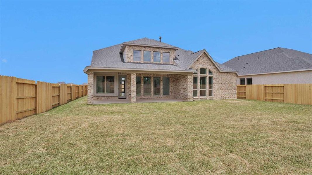Exterior details and patio area of a home in Trinity Falls, McKinney (Image 4).