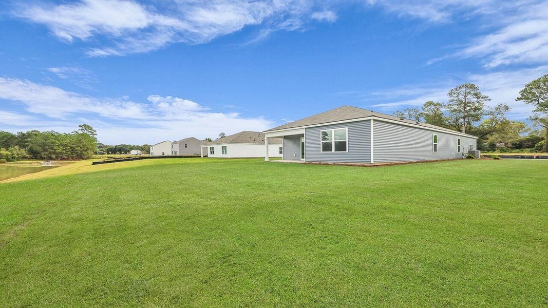 Exterior details and patio area of a home in Huggins Hill, Manning (Image 15).