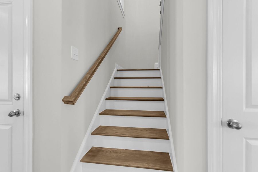 Spacious, unfurnished interior of a new home in Tidewater at Lakes of Cane Bay, Summerville (Image 22).