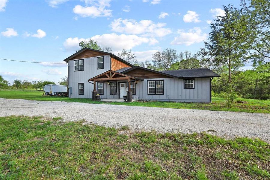 Exterior details and patio area of a home in , Savoy (Image 28). Exterior details and patio area of a home in , Savoy (Image 28).