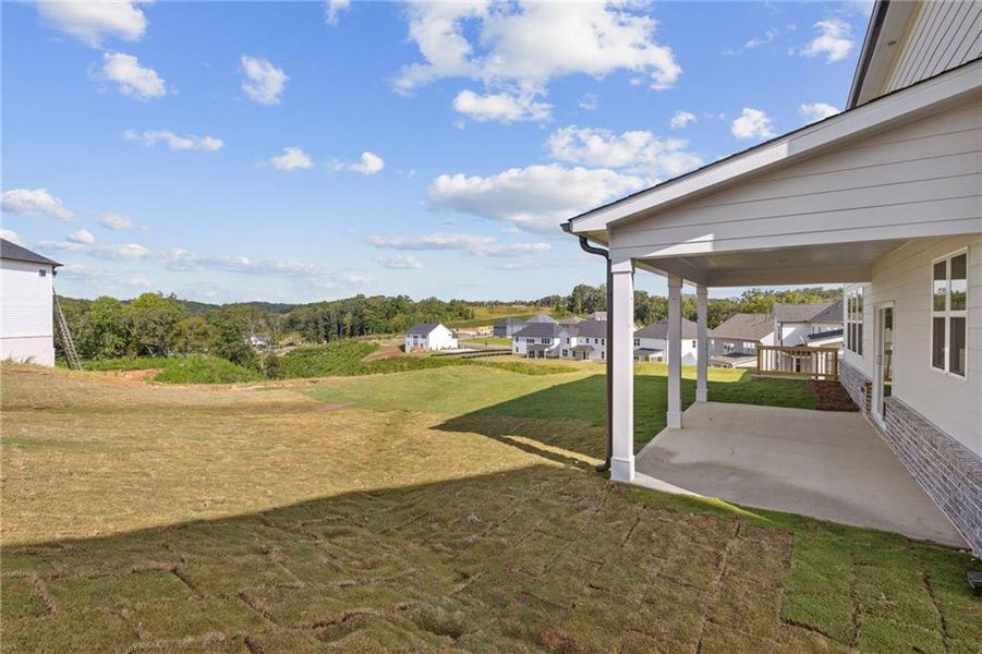 Exterior details and patio area of a home in The Estates at Gainesville Township, Gainesville (Image 9).