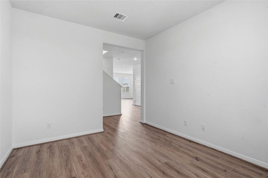 Additional view from the Den into hallway.