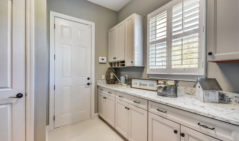 Laundry room with cabinet space