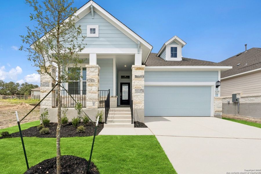 Front exterior of a new home in The Crossvine 45’, Schertz, TX, highlighting curb appeal (Image 1).