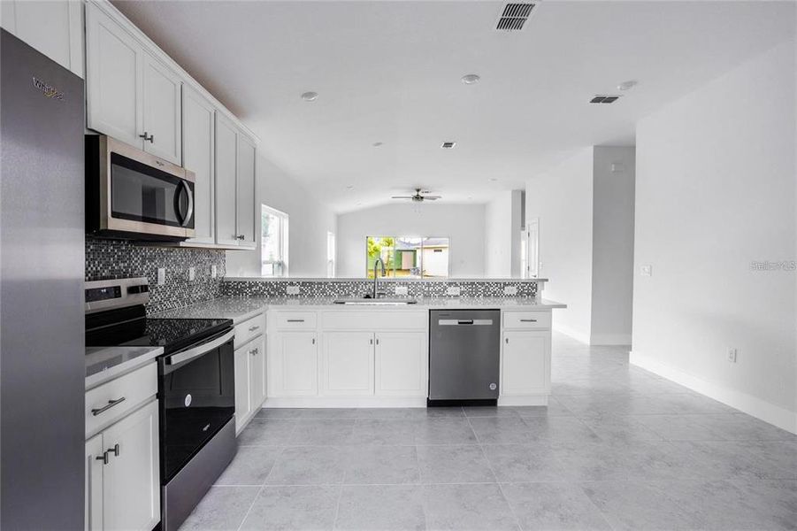 Furnished interior view inside a new home in , Port Charlotte (Image 8).