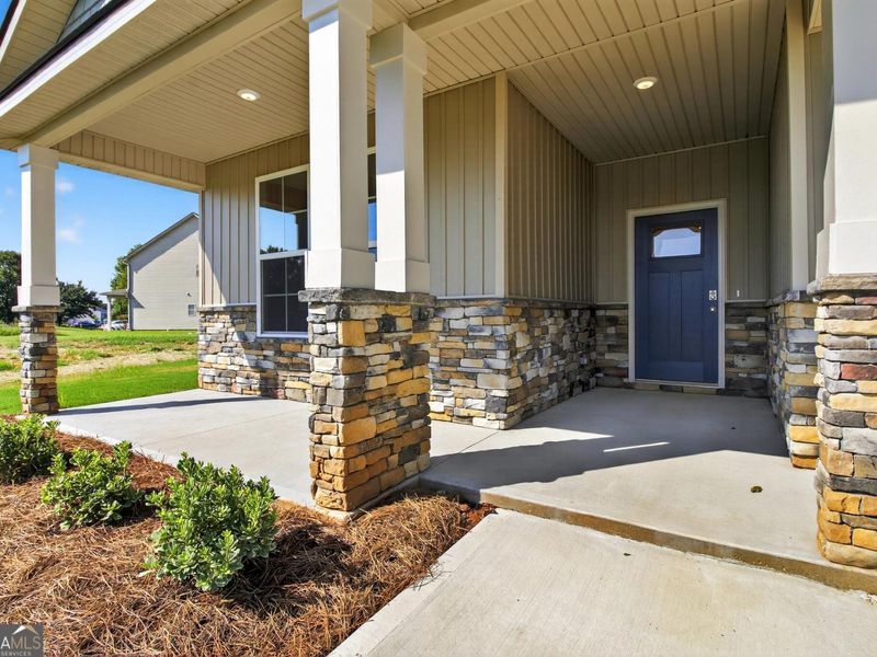 Exterior details and patio area of a home in Ivy Glen, Perry (Image 19).