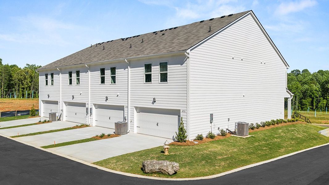 Representative exterior photo of a completed home built from the Amesbury by D.R. Horton in Waypoint, Flowery Branch, GA (Image 19).