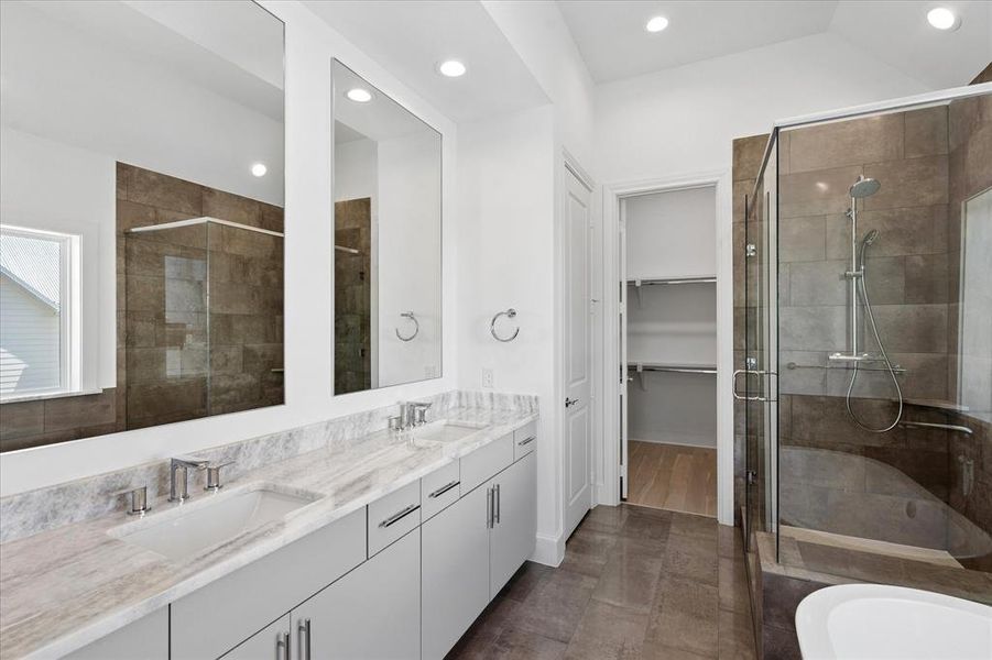 Double vanity with a light-toned countertop, dual rectangular undermount sinks, and brushed nickel fixtures