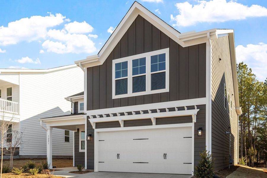 Front exterior of a new home in Sweetbrier, Durham, NC, highlighting curb appeal (Image 21).