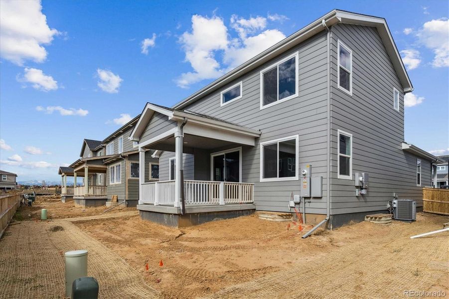Exterior details and patio area of a home in Floret Collection at Parkdale Commons, Lafayette (Image 17).