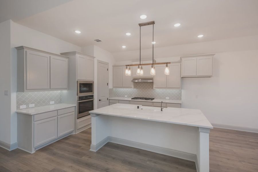 Representative furnished interior of a home built from the Everton by Chesmar Homes in Canyon Falls, Argyle (Image 3).