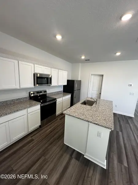 Furnished interior view inside a new home in , Palm Coast (Image 5).