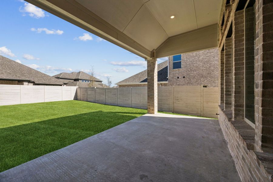 Exterior details and patio area of a home in Painted Tree Lakeside, McKinney (Image 27).