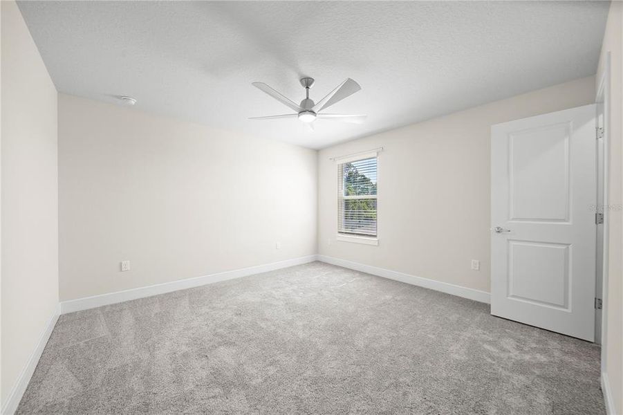 Spacious, unfurnished interior of a new home in Winding Meadows, Apopka (Image 21).