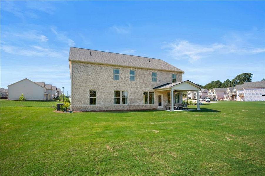 Exterior details and patio area of a home in Adagio, Dacula (Image 3).