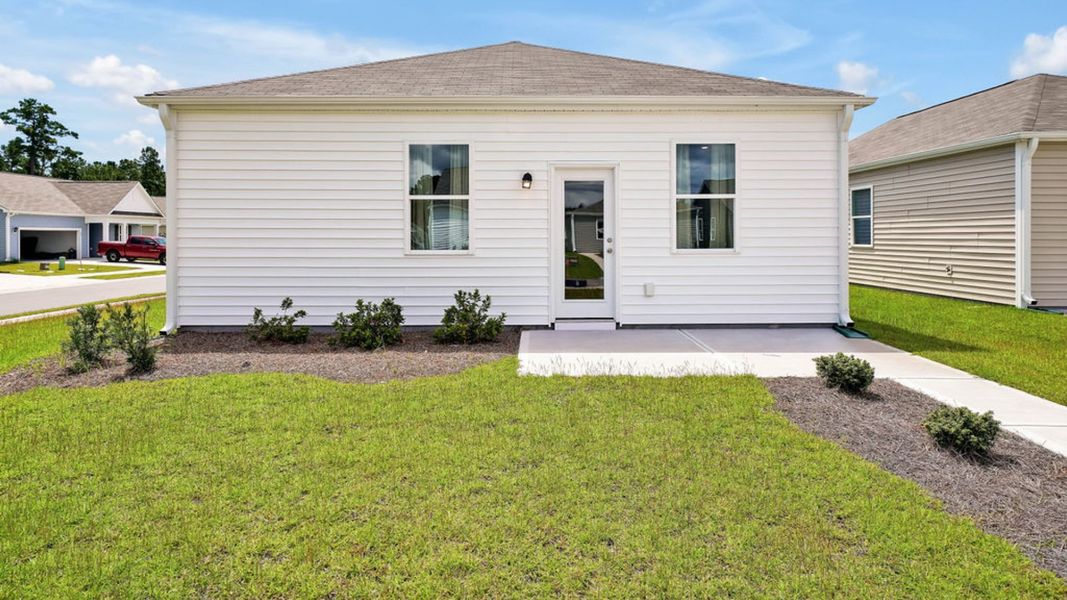 Representative exterior photo of a completed home built from the LEWIS by D.R. Horton in The Cottages at Blake Farm, Wilmington, NC (Image 4).