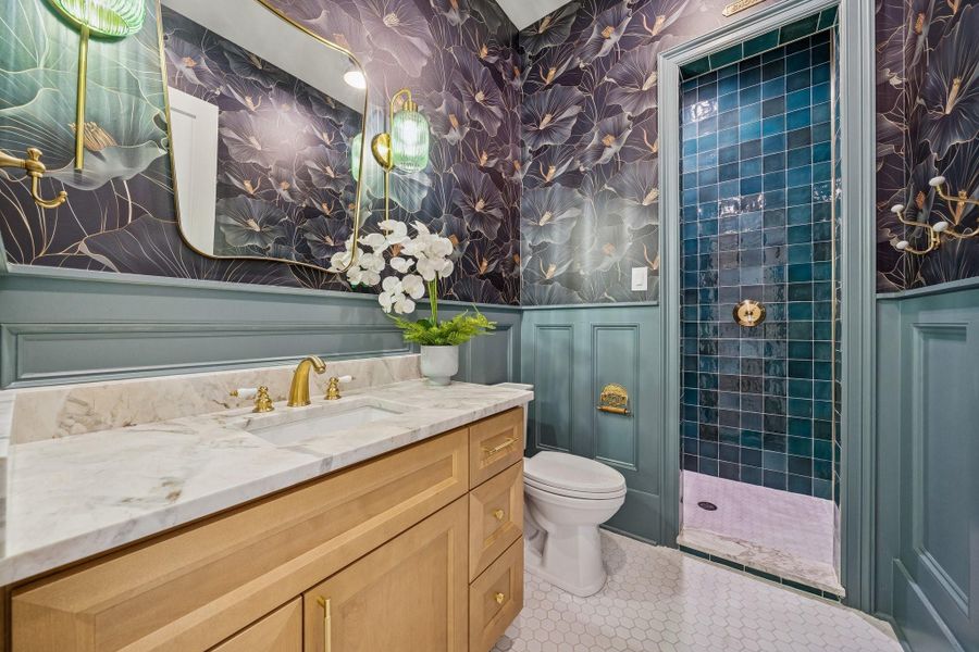 The most gorgeous guest bathroom next to the foyer. That green tile is perfection. The most gorgeous guest bathroom next to the foyer. That green tile is perfection.
