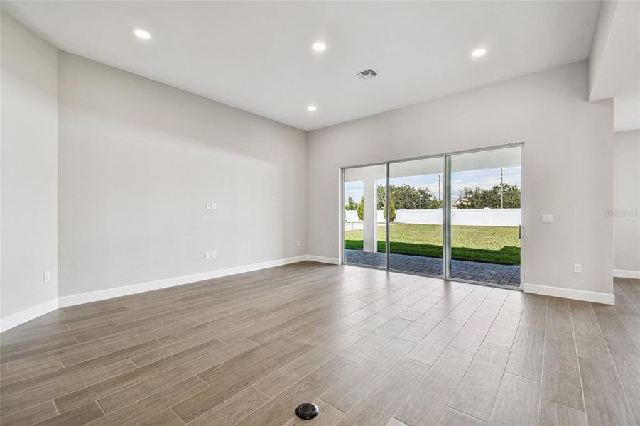 Spacious, unfurnished interior of a new home in Solace at Corner Lake, Orlando (Image 58).