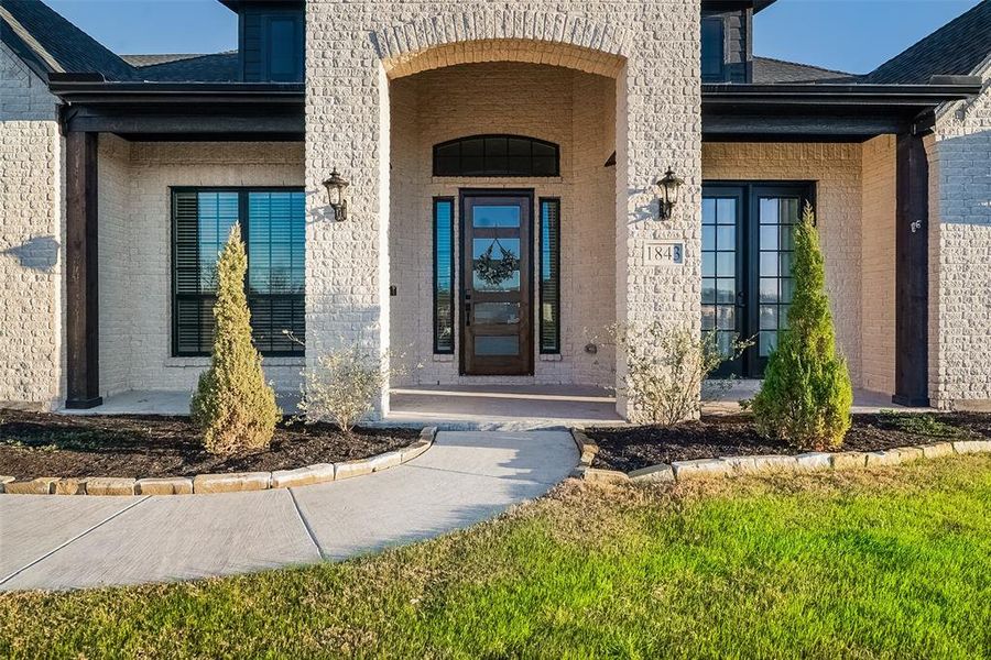 Exterior details and patio area of a home in , Van Alstyne (Image 26).