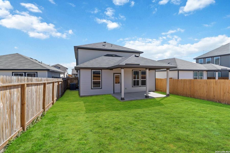 Exterior details and patio area of a home in Red Hawk Landing, San Antonio (Image 20).