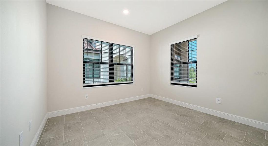 Spacious, unfurnished interior of a new home in Vicenza Real Estate and Homes for Sale in North Venice, FL - Neal Communities, Nokomis (Image 29).