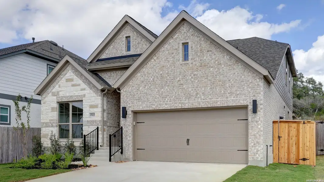 Front exterior of a new home in Ladera, San Antonio, TX, highlighting curb appeal (Image 2).