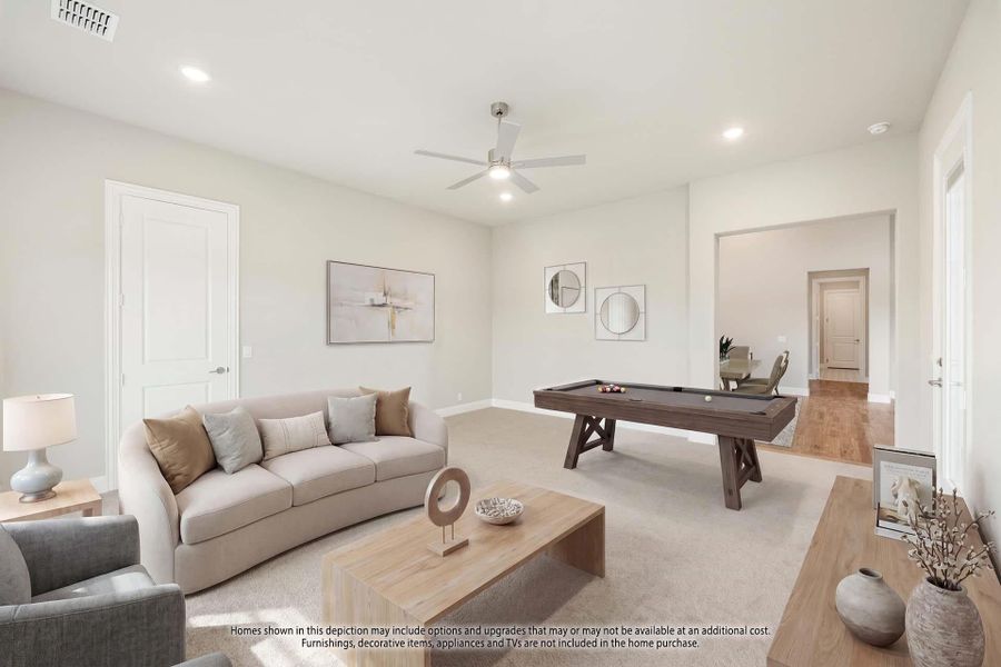 Game room with pool table, sofa, ceiling fan, and carpet flooring in neutral tones