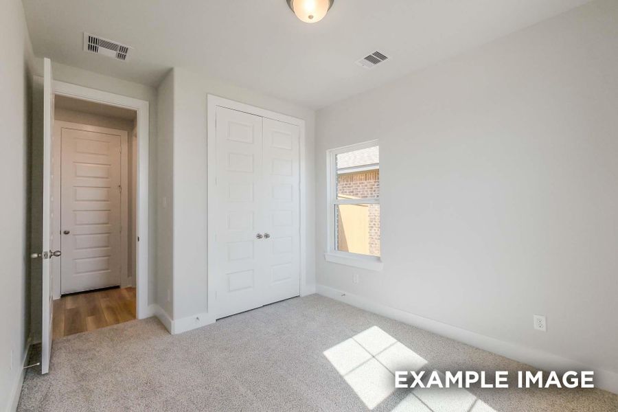 Spacious, unfurnished interior of a new home in Sunterra, Katy (Image 28).