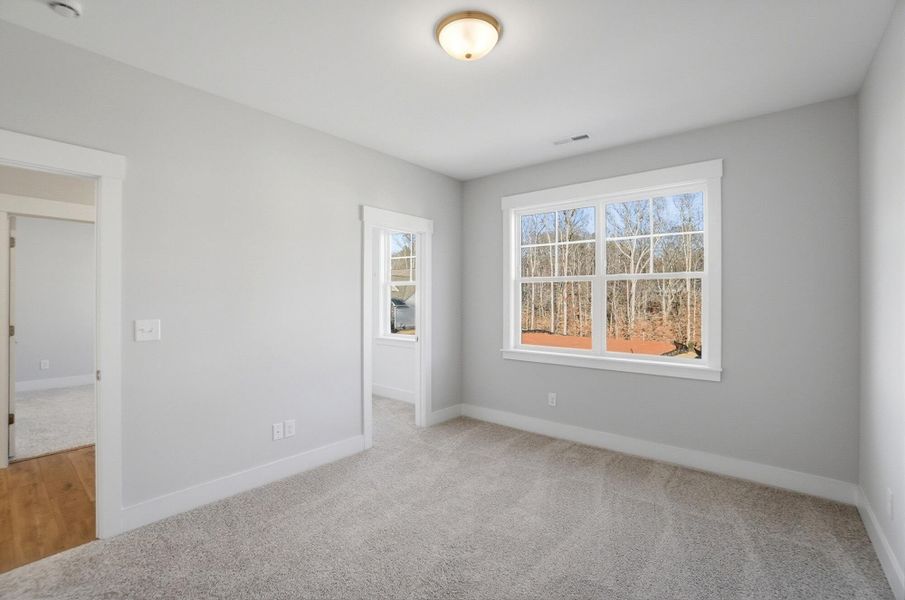 Spacious, unfurnished interior of a new home in Rone Creek, Waxhaw (Image 77).