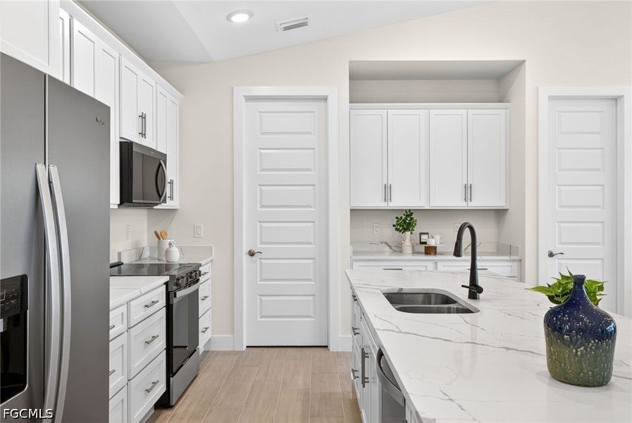 Furnished interior view inside a new home in Cape Coral, Cape Coral (Image 16).