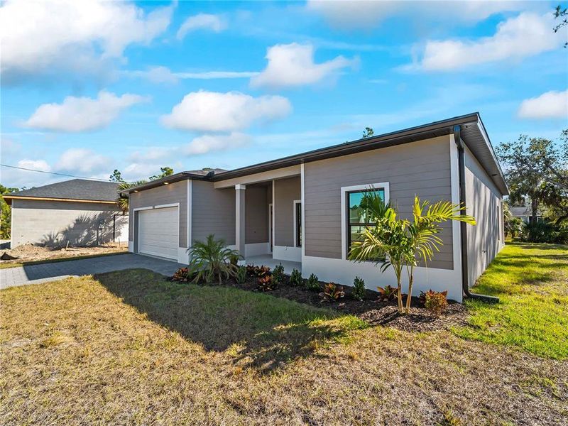 Exterior details and patio area of a home in , North Port (Image 26).