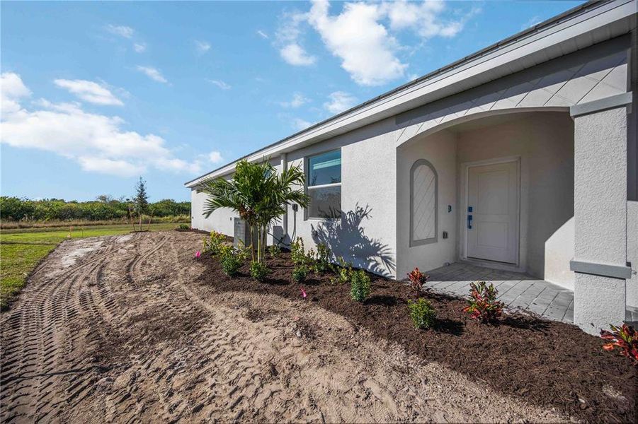 Exterior details and patio area of a home in Palm Lake at Coco Bay, Englewood (Image 25). Exterior details and patio area of a home in Palm Lake at Coco Bay, Englewood (Image 25).