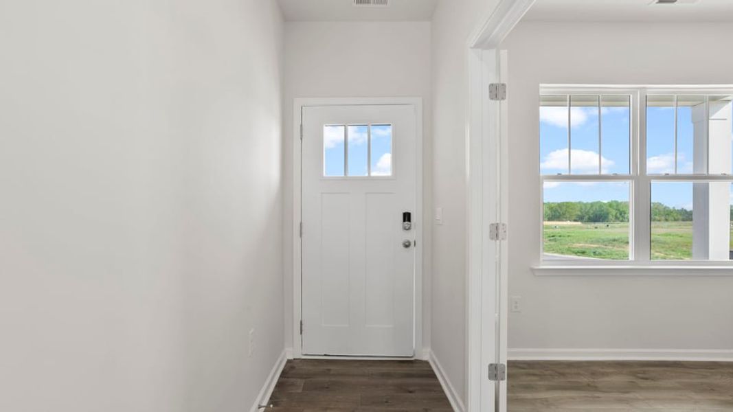 Spacious, unfurnished interior of a new home in Durbin Meadows Traditions, Fountain Inn (Image 17).